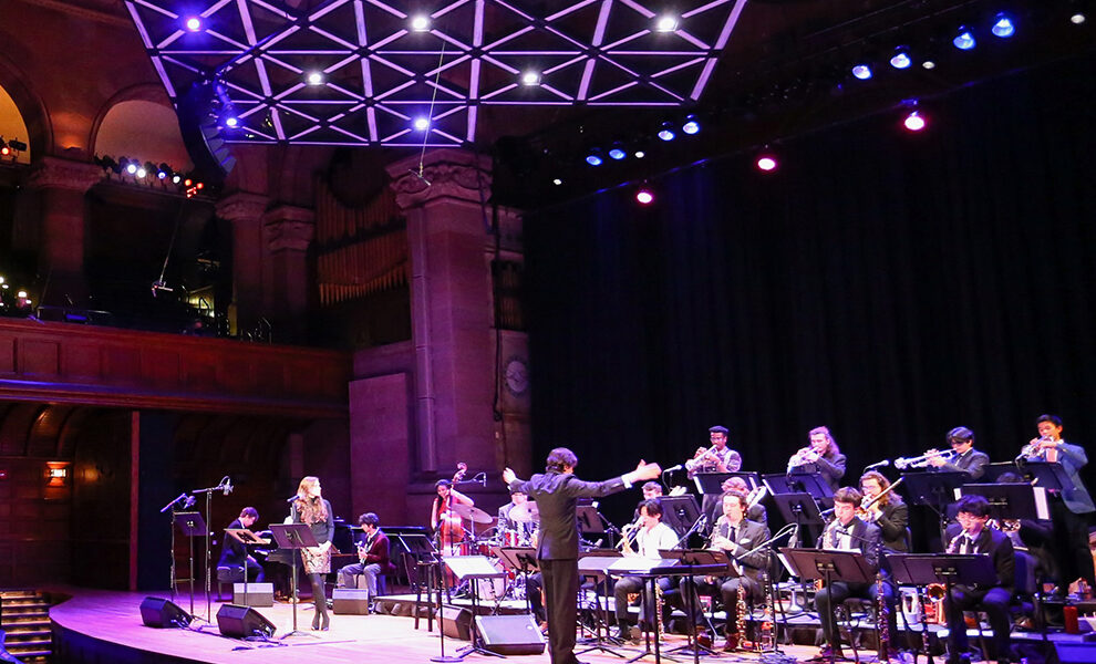 Jazz's Large Ensemble playing on stage during a live performance
