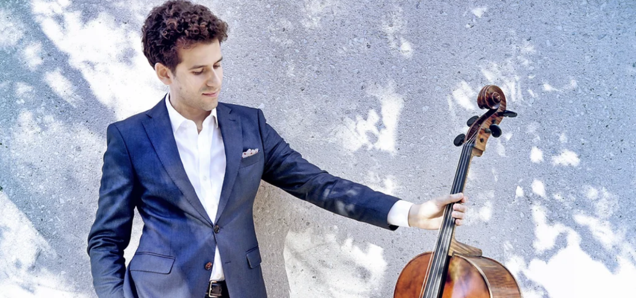 photo of nicholas canellakis, looking at his cello