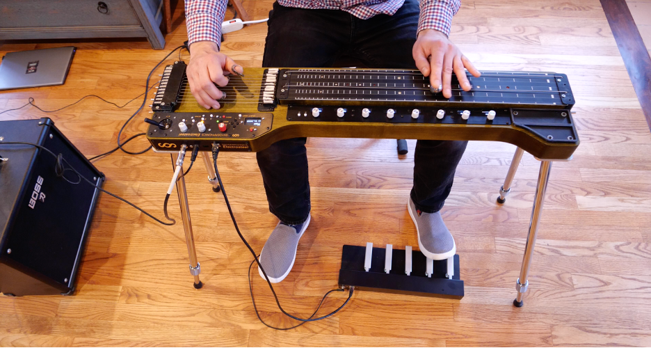 Musician playing the Electrosteel instrument